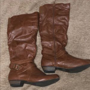 Tall brown leather boots